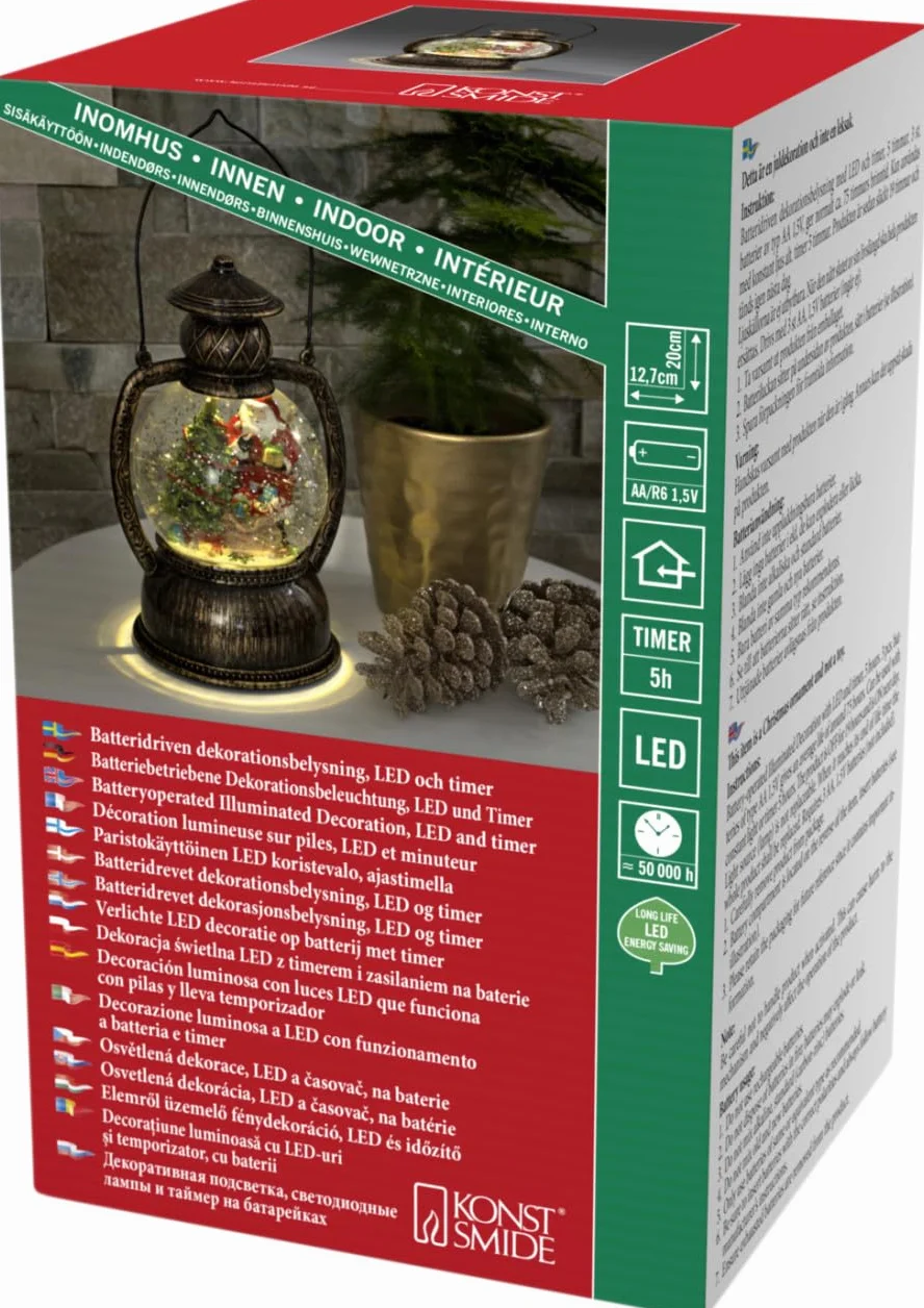 Lanterne à bille LED Konstsmide 3497-000 Père Noël, avec minuterie de 5 h, remplie d'eau, blanc chaud, à piles, intérieure, scène du père Noël, diamètre 12,7 cm