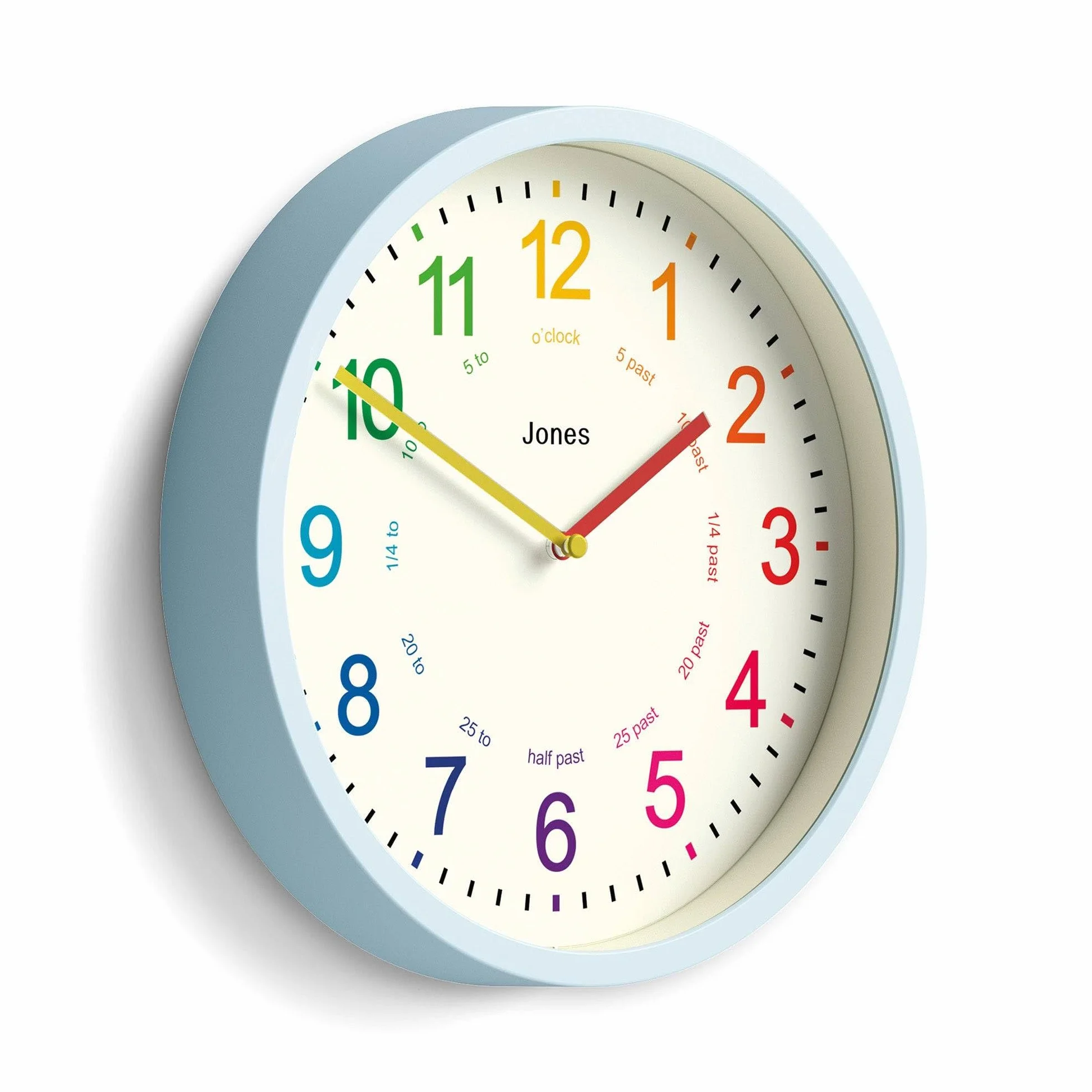 JONES CLOCKS® Kids Horloge Murale | Petite Horloge Moderne pour nurserie pour Enfants | 25cm | Bleu pâle | Cadran coloré pour Apprendre à Lire l’Heure